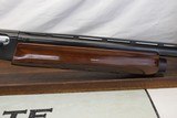 Remington 1100 semi-auto shotgun 12Ga. 28" Vented Rib Barrel Engraved - 4 of 14