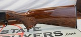 Remington 1100 semi-auto shotgun 12Ga. 28" Vented Rib Barrel Engraved - 12 of 14