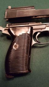 Walther / Mauser. Model P-38 semi auto pistol.
- 6 of 15