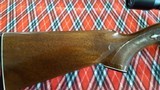 Remington.
Model 1100LH semi auto shotgun.(left hand) - 7 of 11
