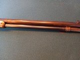 Winchester. Model 1886 lever action rifle - 5 of 15