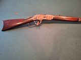 winchester. model 1873 lever action rifle.