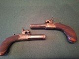 CASED PAIR OF SCREW BARREL, FOLDING TRIGGER, PERCUSSION MUFF PISTOLS - 3 of 15