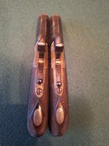 CASED PAIR OF SCREW BARREL, FOLDING TRIGGER, PERCUSSION MUFF PISTOLS - 8 of 15