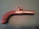 CASED PAIR OF SCREW BARREL, FOLDING TRIGGER, PERCUSSION MUFF PISTOLS - 7 of 15