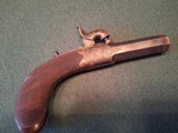 CASED PAIR OF SCREW BARREL, FOLDING TRIGGER, PERCUSSION MUFF PISTOLS - 4 of 15