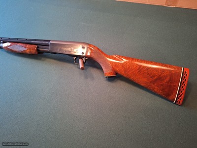 ITHACA.  Model 37 DELUXE SUPREME GRADE FEATHERLIGHT Pump Shotgun