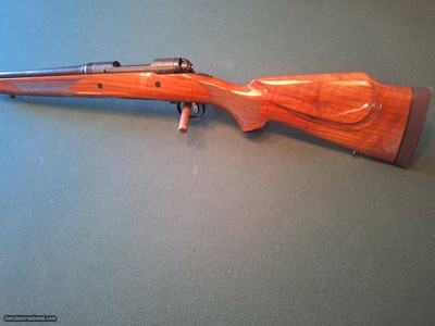 Savage. Model 110. Bolt action rifle.  Limited 125th Anniversary Engraved rifle