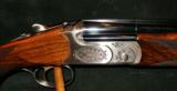 CAESAR GUERINI SUMMIT SPORTING 28GA O/U SHOTGUN - 1 of 5