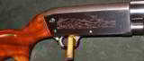 ITHACA MODEL 37 FEATERWEIGHT 12GA PUMP SHOTGUN - 1 of 5