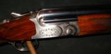CAESAR GUERINI SUMMIT SPORTING 12GA O/U SHOTGUN - 1 of 5
