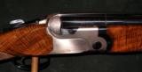 BERETTA DT TRIDENT SPORTING 12GA O/U SHOTGUN - 1 of 5