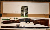 REMINGTON MODEL 1100 CLASSIC TRAP 12GA AUTOLOADING SHOTGUN - 1 of 2