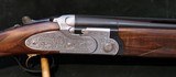 BERETTA 687 EELL 12GA O/U SHOTGUN - 1 of 5