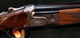 CAESAR GUERINI SUMMIT SPORTING 12GA O/U SHOTGUN - 1 of 5