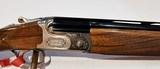 CAESAR GUERINI SUMMIT SPORTING 12GA O/U SHOTGUN - 1 of 5