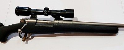 CHAMPLIN FIREARMS INC. CUSTOM PRE 64 MODEL 70, 340 WBY MAG RIFLE