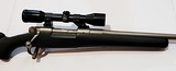 CHAMPLIN FIREARMS INC. CUSTOM PRE 64 MODEL 70, 340 WBY MAG RIFLE