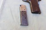 Colt Government Model (1911) commercial
Serial Number C 9977 - 5 of 12