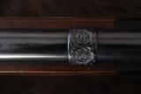 Griffin & Howe 375 H&H Jos.Fugger Engraved with fabulous Lion scene, G&H scope mount
- 14 of 18