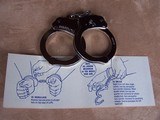 Colt Handcuffs from the 1960's. New in original Box. - 12 of 14