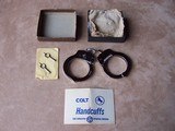 Colt Handcuffs from the 1960's. New in original Box. - 1 of 14
