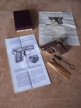 Colt Nickel 1908 .25 Auto in the box with brush & paperwork. Excellent. - 1 of 20