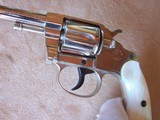 Colt Nickel New Police .32 with a 4” barrel and Pearl grips in the box with paperwork & Colt Letter. Made in 1904 and in excellent condition - 19 of 20