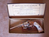 Colt Nickel New Police .32 with a 4” barrel and Pearl grips in the box with paperwork & Colt Letter. Made in 1904 and in excellent condition - 20 of 20