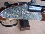 Josef Winkler of Austria O/U Sidelock Double Rifle Profusely Engraved with African animals & Includes two sets of barrels with Zeiss Scopes - 11 of 20