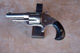 Otis Smith nickel spur trigger revolver. Chambered in .38 Short Rimfire with 2 1/2” barrel. Excellent condition Antique.