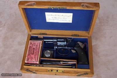 Colt New Police chambered in .32 Police Cartridge housed in a British Case with lots of Accessories. Excellent complete package.