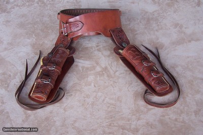 Heiser two gun set of sheepskin lined holsters and belt rig set for a pair of 4 3/4” or 5 1/2” barrel length SAA revolvers