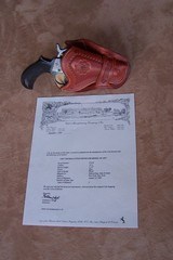Colt Model 1877 chambered in .41 caliber with a 2 1/2” barrel. Factory checkered rosewood grips, R.M. Bachman holster and period correct ammo box - 11 of 20