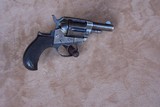 Colt Model 1877 chambered in .41 caliber with a 2 1/2” barrel. Factory checkered rosewood grips, R.M. Bachman holster and period correct ammo box - 13 of 20