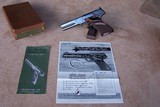 Colt 2nd Model Match Target Woodsman with the 4 1/2” Barrel, Sanderson Grips, Original Box and Paperwork - 1 of 19