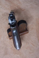 Colt Model 1911 from 1918 with Holster, Period Box of Ammo,
Colt Archive Letter and Pistol Stand - 8 of 20