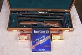 Gary Stiles Switch Barrel Mauser action rifle in .25-06 and .35 Whelen with 1 1/2-4 1/2 and 3-9 Swarovski scopes in Huey Trunk Case W/Accessories