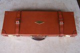 Gary Stiles Switch Barrel Mauser action rifle in .25-06 and .35 Whelen with 1 1/2-4 1/2 and 3-9 Swarovski scopes in Huey Trunk Case W/Accessories - 17 of 18