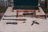 Gary Stiles Switch Barrel Mauser action rifle in .25-06 and .35 Whelen with 1 1/2-4 1/2 and 3-9 Swarovski scopes in Huey Trunk Case W/Accessories - 15 of 18