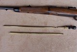 Gary Stiles Switch Barrel Mauser action rifle in .25-06 and .35 Whelen with 1 1/2-4 1/2 and 3-9 Swarovski scopes in Huey Trunk Case W/Accessories - 16 of 18