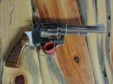 SMITH AND WESSON MODEL 34 4" NICKEL REVOLVER IN .22LR - 1 of 8