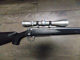 REMINGTON M-700 STAINLESS RIFLE
IN .300 WINCHESTER MAG W/LEUPOLD SCOPE - 3 of 10