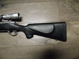 REMINGTON M-700 STAINLESS RIFLE
IN .300 WINCHESTER MAG W/LEUPOLD SCOPE - 6 of 10