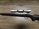 REMINGTON M-700 STAINLESS RIFLE
IN .300 WINCHESTER MAG W/LEUPOLD SCOPE - 7 of 10