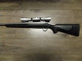 REMINGTON M-700 STAINLESS RIFLE
IN .300 WINCHESTER MAG W/LEUPOLD SCOPE - 5 of 10