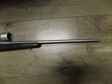 REMINGTON M-700 STAINLESS RIFLE
IN .300 WINCHESTER MAG W/LEUPOLD SCOPE - 4 of 10
