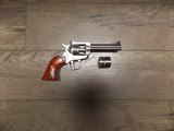 RUGER NEW MODEL SINGLE SIX
STAINLESS
REVOLVER 22 LR, 22 MAG - 1 of 2