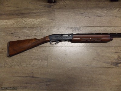 REMINGTON 1100 12 GA SHOTGUN