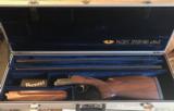PRE-OWNED PERAZZI MX2000/8
2 BARREL SET W/TUBE SETS (20/28/.410) AND CASE - 1 of 18